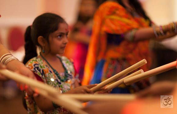 Child playing Dandiya